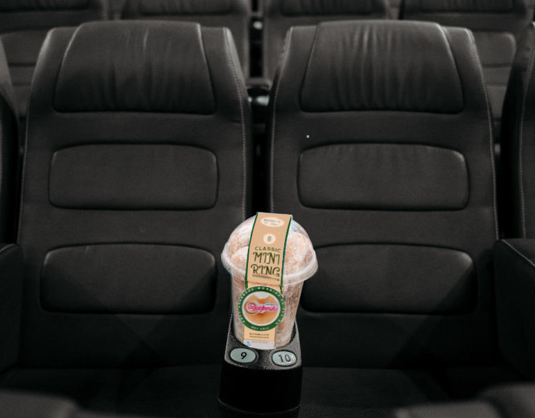 Classic Mini Ring Doughnut in a cinema seat cup-holder