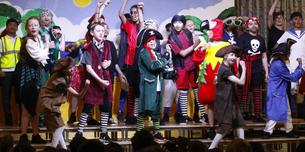 Pupils on stage at the pirate-themed school production.